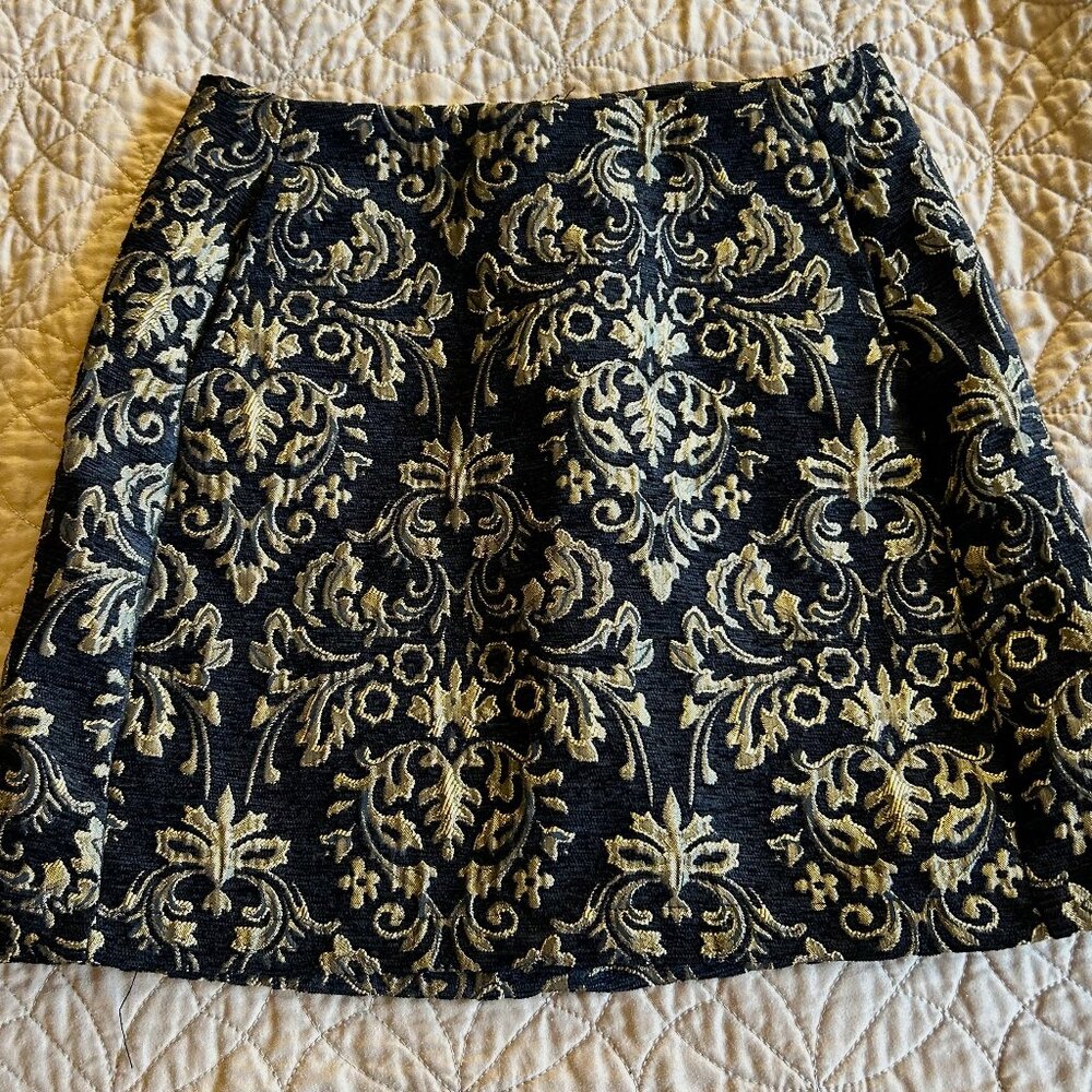 Urban Outfitters black/gold jacquard mini skirt, size XS